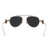 White aviator sunglasses with black lenses and gold-tone bridge details