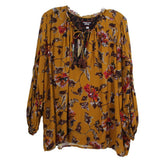 Yellow floral blouse with tassel tie neckline, long puff sleeves, flowing fit