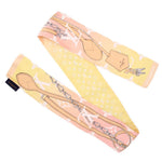 LOUIS VUITTON bandeau scarf in pink with chain and bag charm print