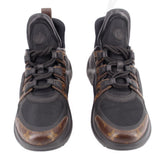 Black monogram lace-up sneakers, front view with brown patterned toe and mesh sides