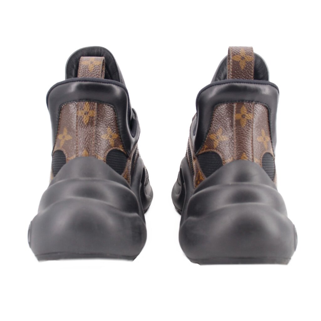 Back view of black monogram sneakers with high collar and heel pull tab