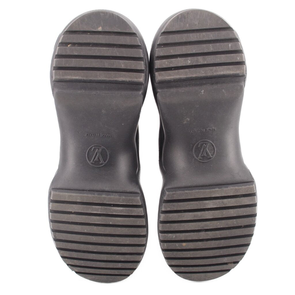 Black rubber outsole for monogram sneakers, treaded stripes on heel and toe