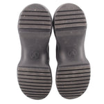 Black rubber outsole for monogram sneakers, treaded stripes on heel and toe