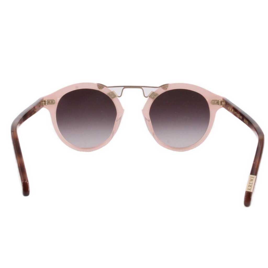 Blush pink cat-eye sunglasses with dark tinted lenses and gold-tone accents