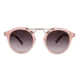Blush pink cat-eye sunglasses with dark tinted lenses and gold-tone details