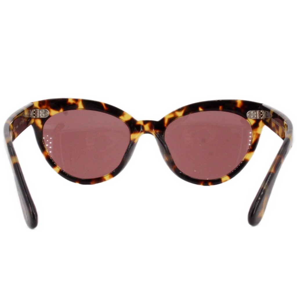 Tortoise cat-eye sunglasses with dark pink lenses and jeweled details