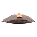 Monogram belt bag with zipper closure, top handle, and tan leather label