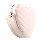 GUCCI cream heart crossbody bag side view with zipper and curved shoulder strap
