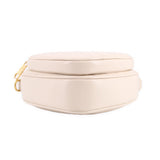 GUCCI cream heart crossbody bag top view with twin-zip closure and gold hardware