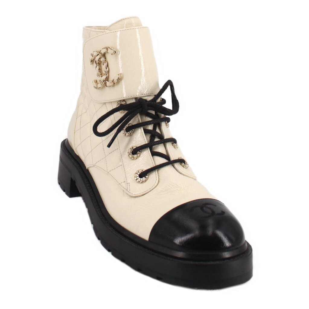 Cream quilted leather lace-up boots with black laces and gold CC emblem