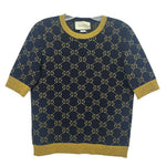 Navy Gucci logo sweater with gold GG pattern, crew neck and ribbed cuffs.