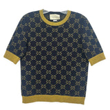 Navy Gucci logo sweater with gold GG pattern, crew neck and ribbed cuffs.