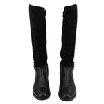 Black knee-high riding boots, front view, rounded toe and short stacked heel