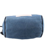 Denim blue pouch with gathered top and black drawstring cords