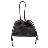 Black drawstring handle bag with gold-tone hardware and short carry handles