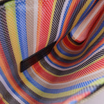 Close-up of multicolor striped mesh pouch with black trim and stitched edge