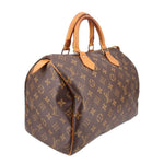 LOUIS VUITTON Speedy 30 vintage handle bag, side view, monogram canvas and leather handles