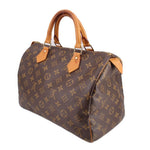 LOUIS VUITTON Speedy 30 vintage handle bag, angled view, monogram canvas and leather trim