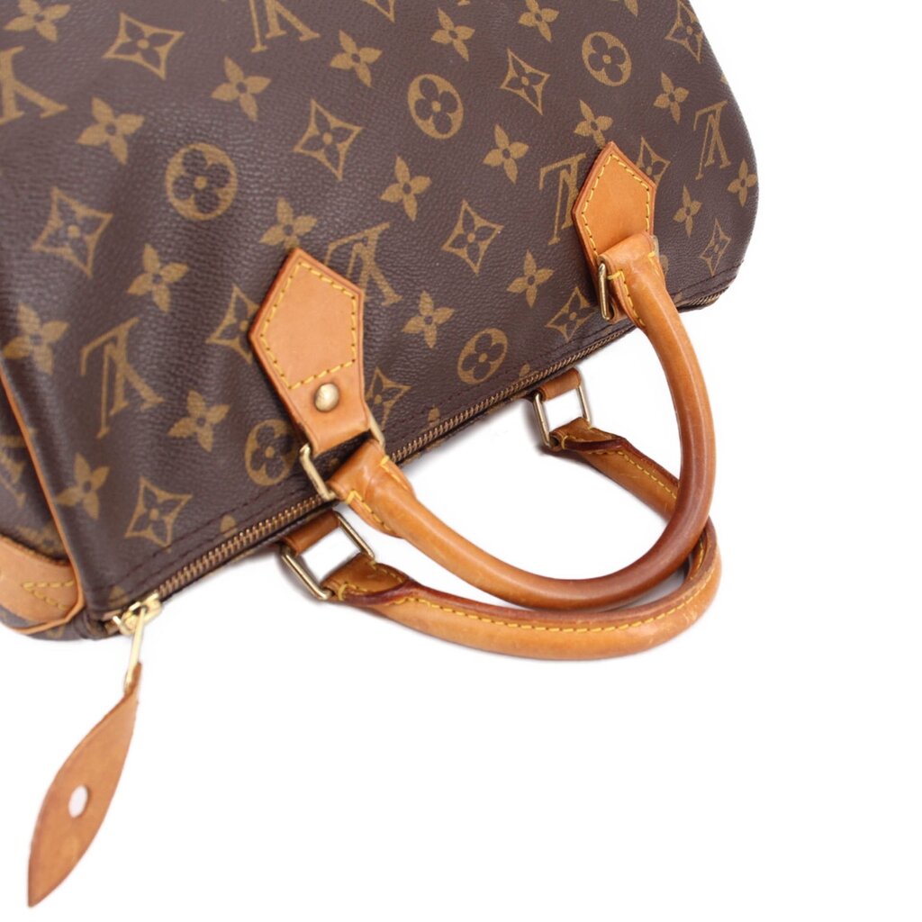 LOUIS VUITTON Speedy 30 vintage handle bag close-up of handles, tan leather and monogram