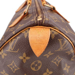 LOUIS VUITTON Speedy 30 bag interior badge and stitched edge with monogram lining