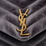 Gold-tone YSL logo on black quilted leather flap of shoulder bag