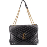 Black quilted large shoulder bag with chain strap and YSL clasp