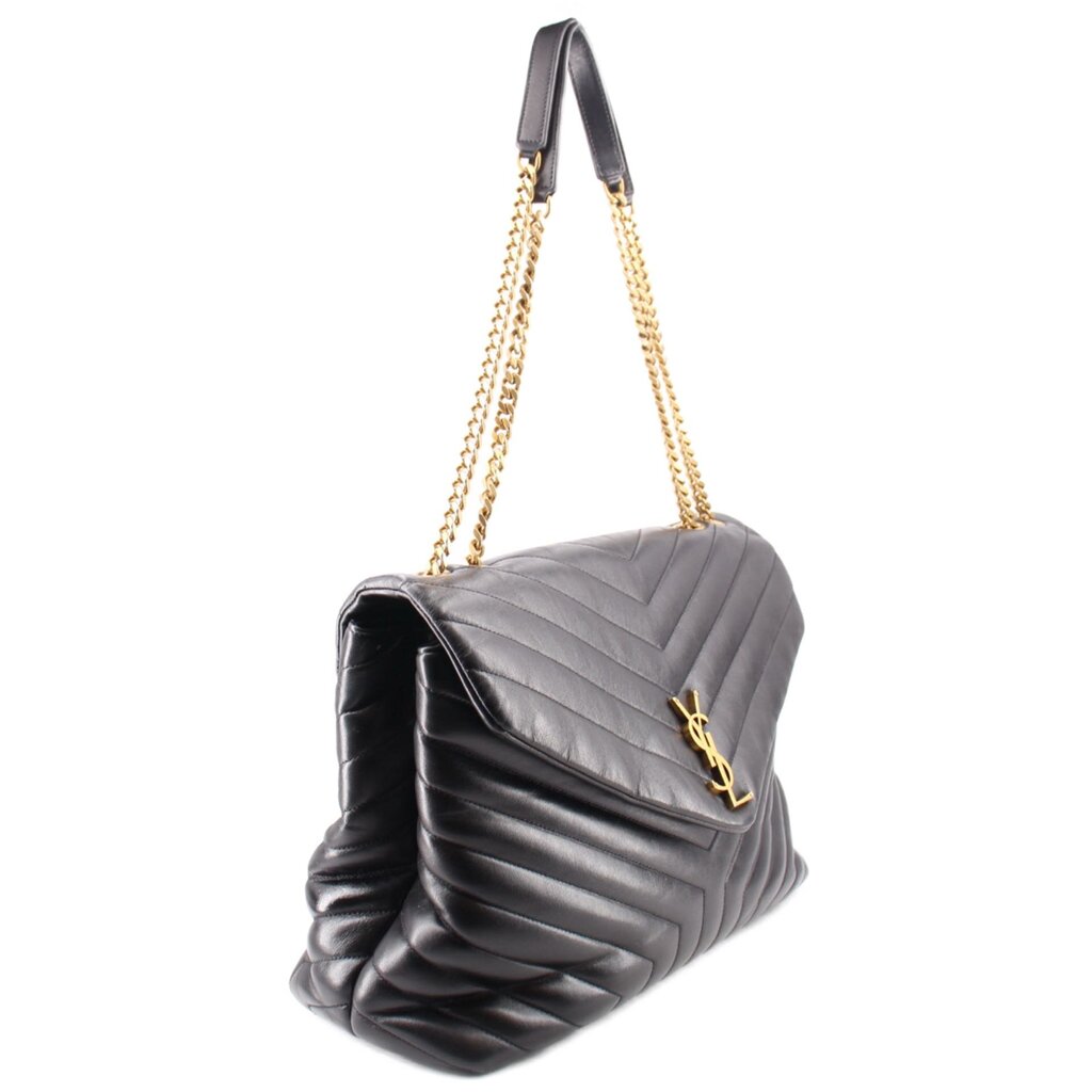 Black quilted shoulder bag, side view, with gold-tone chain strap and YSL logo