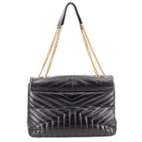 Black quilted large shoulder bag with top flap and gold-tone YSL emblem