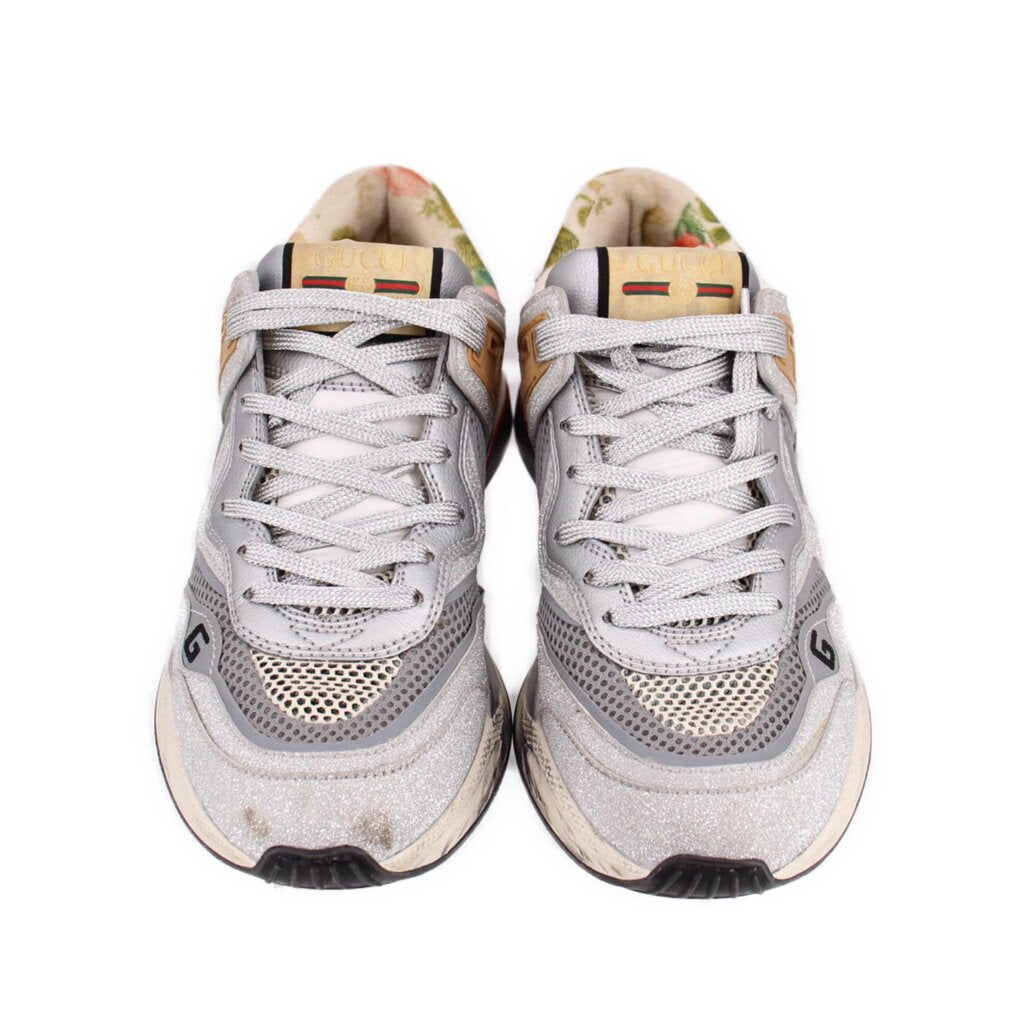 GUCCI Ultrapace silver sparkling sneakers, front view, with flat laces and perforated side panels
