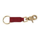 Red leather keychain with gold ring, stamped logo, and swivel clasp hardware