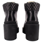 GUCCI platform boots, black leather, back view with quilted ankle and block heel
