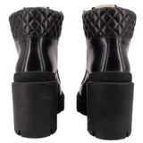 GUCCI platform boots, black leather, back view with quilted ankle and block heel