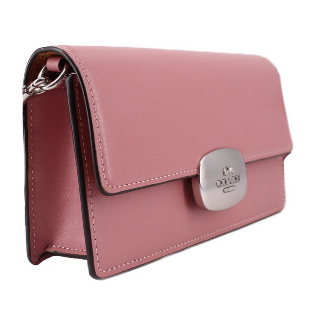 Rose leather flap crossbody bag with silver-toned logo clasp and adjustable crossbody strap