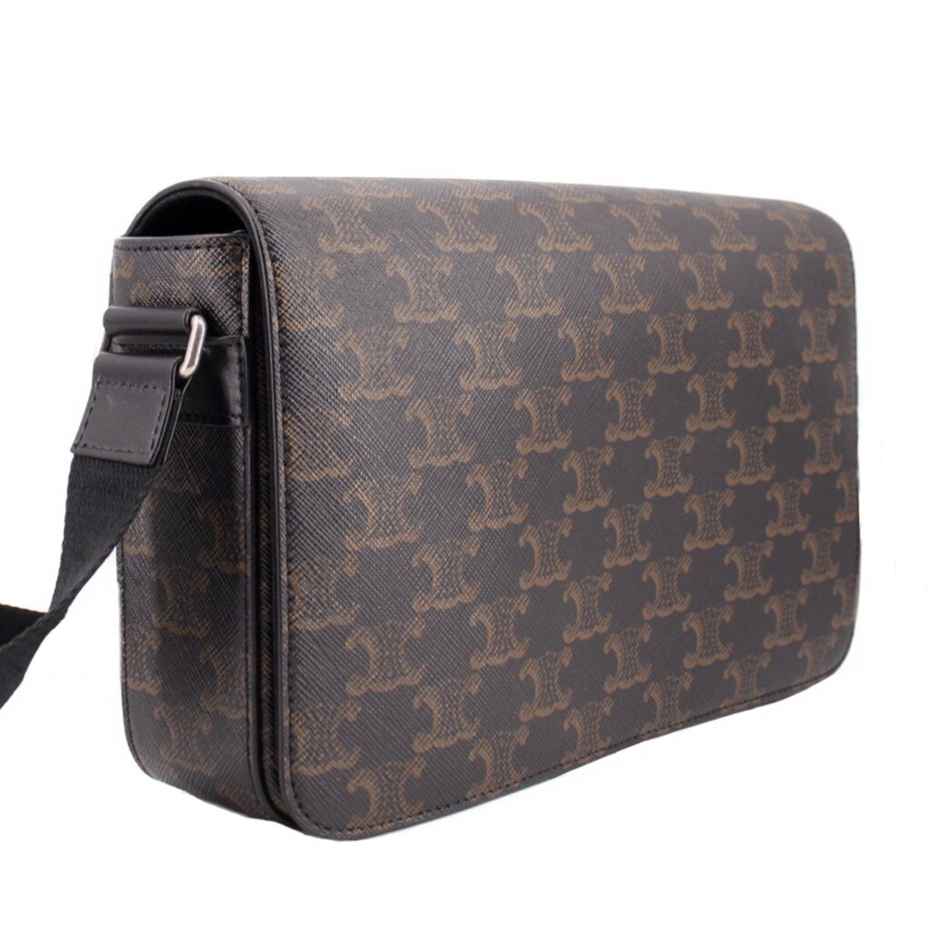 Brown patterned crossbody bag side view with metal ring strap attachment