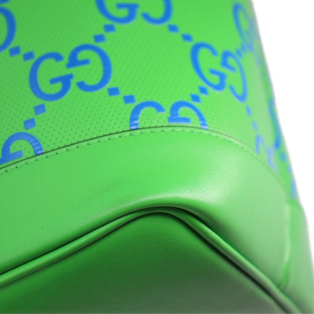 GUCCI GG tote bag detail: green textured trim with navy GG monogram fabric panel