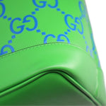 GUCCI GG tote bag detail: green textured trim with navy GG monogram fabric panel