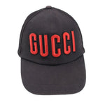 Black cap with red embroidered GUCCI logo on front