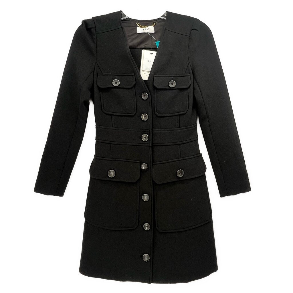 Black long-sleeve dress with button front, flap pockets, and structured waist panels