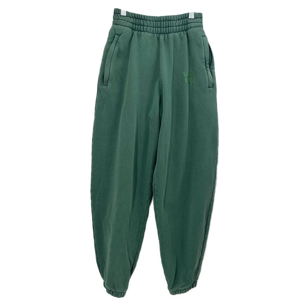 Green knit jogger pants with elastic waist and side pockets