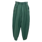 Green knit jogger pants with elastic waist and side pockets