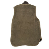 Reversible sherpa vest back in tan with full-coverage fuzzy texture