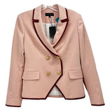 Double-breasted pink blazer with burgundy trim, gold buttons, flap pockets