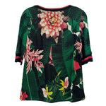 Green floral print knit top with crew neck and striped sleeve cuffs