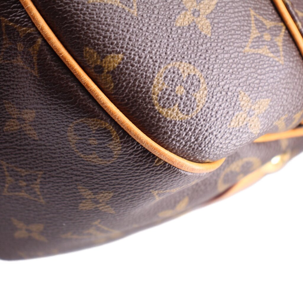 LOUIS VUITTON Galleria PM monogram bag corner close-up with tan leather edging
