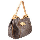 LOUIS VUITTON Galleria PM shoulder bag, monogram canvas with tan shoulder straps