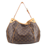 LOUIS VUITTON Galleria PM shoulder bag with monogram print and tan leather trim