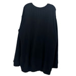 Black tunic sweater with relaxed long sleeves and crew neck; plain front