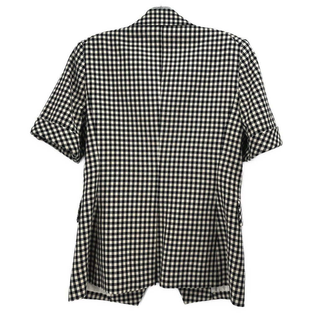 Back view short-sleeve blazer in black-and-white check pattern with center seam