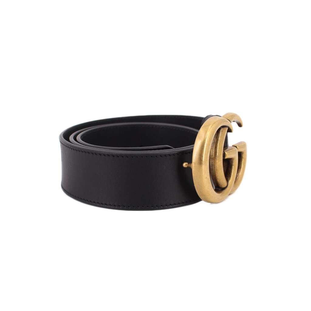 Black leather belt with gold GG buckle, side view