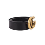 Black leather belt with gold GG buckle, side view